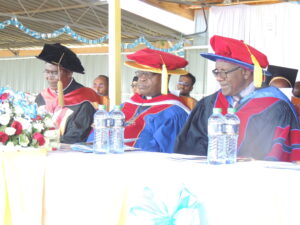 Chief Guest Prof. Chacha Nyaigitti-Chacha (Right)Chancellor Most Rev.Zacchaeus Okoth and Vice chancellor Rev.Dr.Cosmas R.K'otieno during the 2nd Graduation at Uzima University