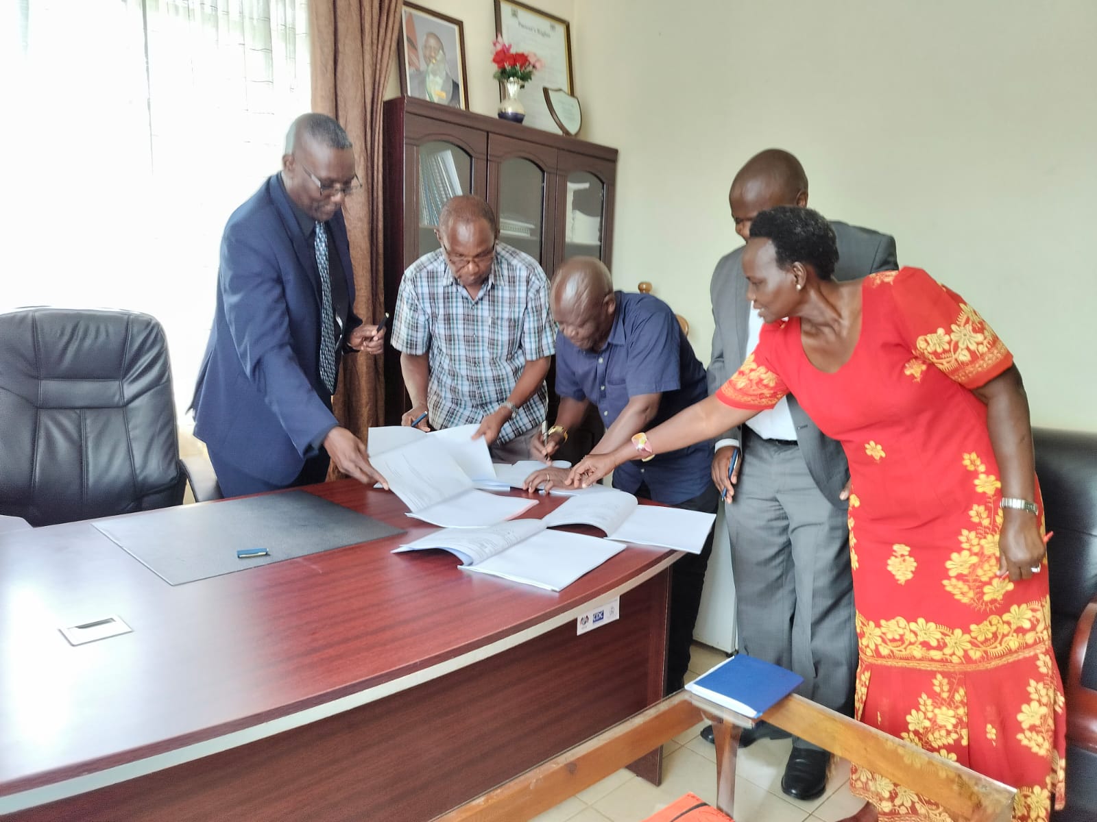 MOU signing with Siaya County Teaching and Referral Hospital lead by Prof.Chris Oyoo from Uzima and Dr.Ogoti Evans Medical Superintendent SCTRH