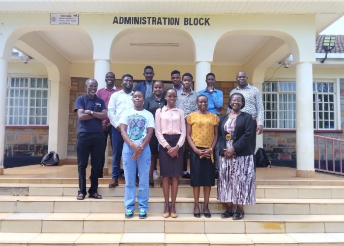 Student leaders and a section of staff pose for a photo after one of the induction workshop sessions
